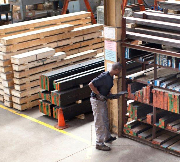 A man placing new stock into the Zanogen inventory A man placing new stock into the Zanogen inventory